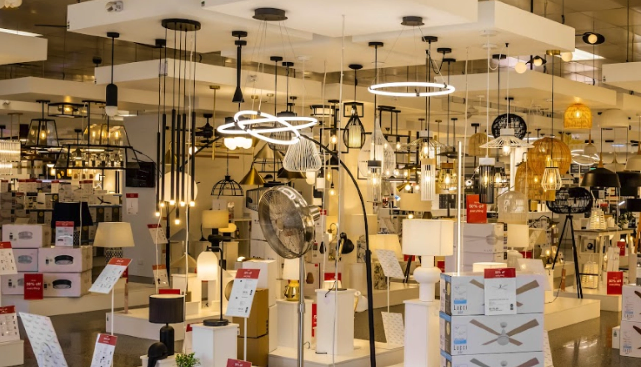 Retail lighting showroom with pendant lights, ceiling fixtures, and modern lamp displays